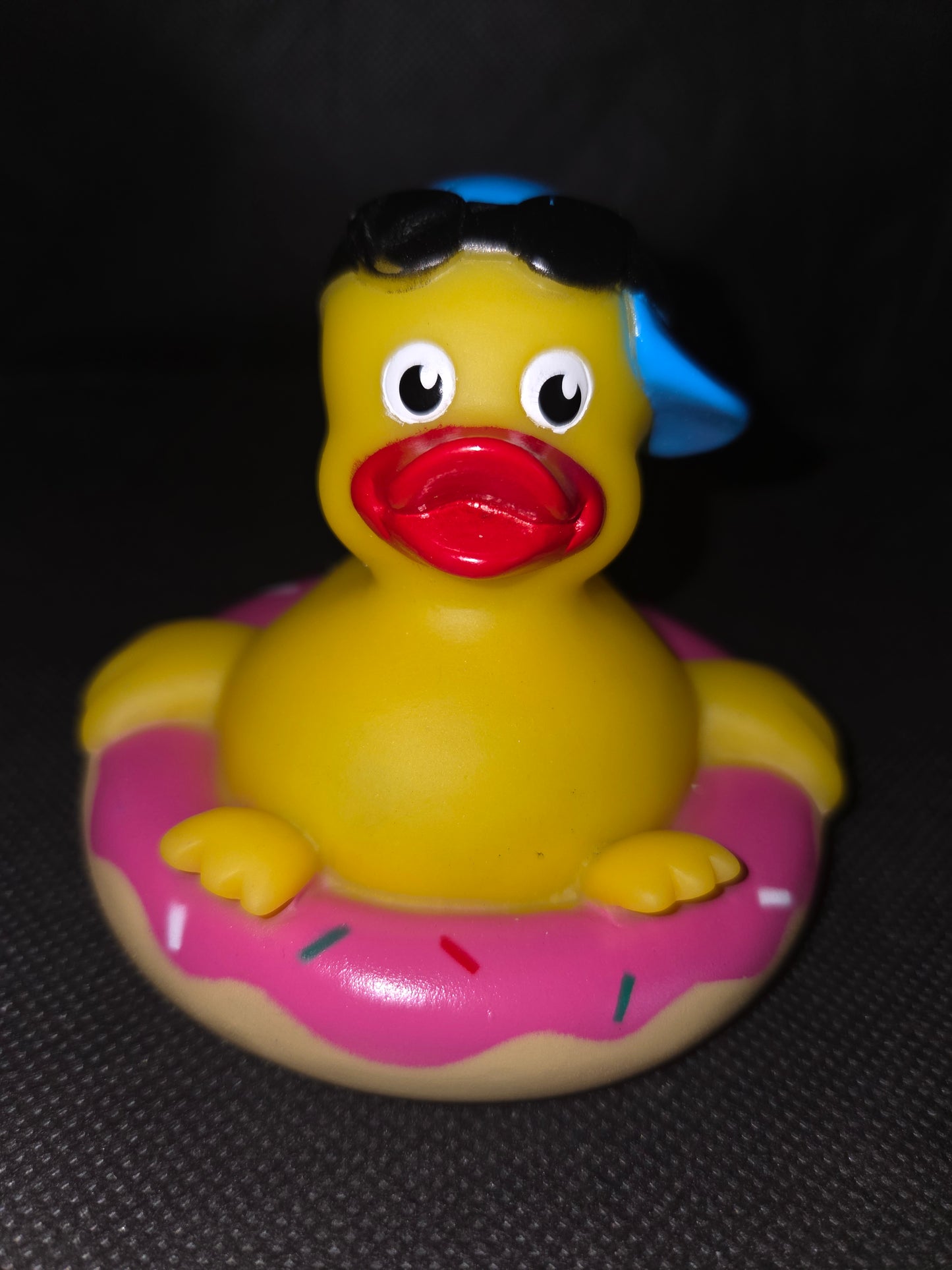 Rubber Duck - Floating on a Donut